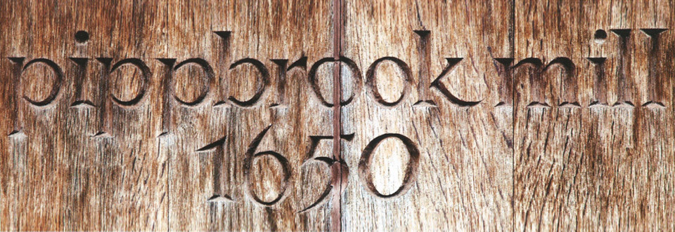 Door carving, Pippbrook Mill 1650